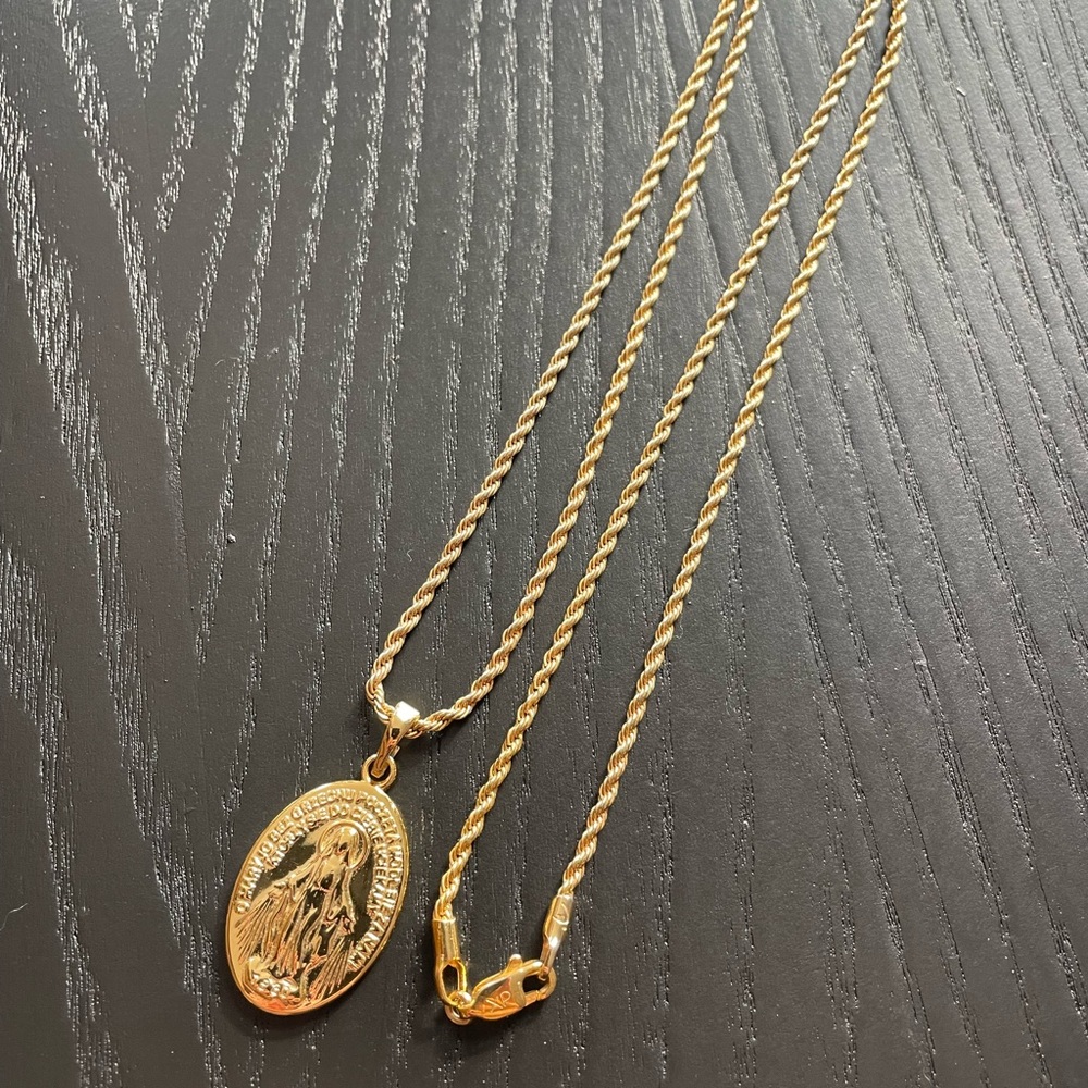 Gold plated necklace with saint pendant